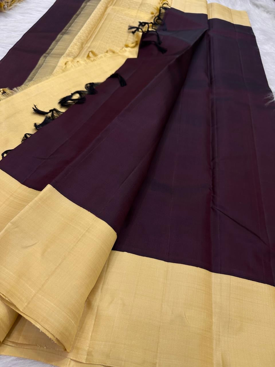 Deep aubergine Kanchipuram silk saree with butter yellow contrast border, full view