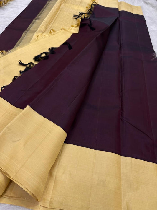 Deep aubergine Kanchipuram silk saree with butter yellow contrast border, full view