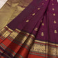 Deep Aubergine Kancheepuram Saree — Korvai border with burnt-orange silk-thread panel and gold zari peacock motifs
