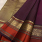 Deep Aubergine Kancheepuram Saree — pallu detail with burnt-orange and gold zari peacock work