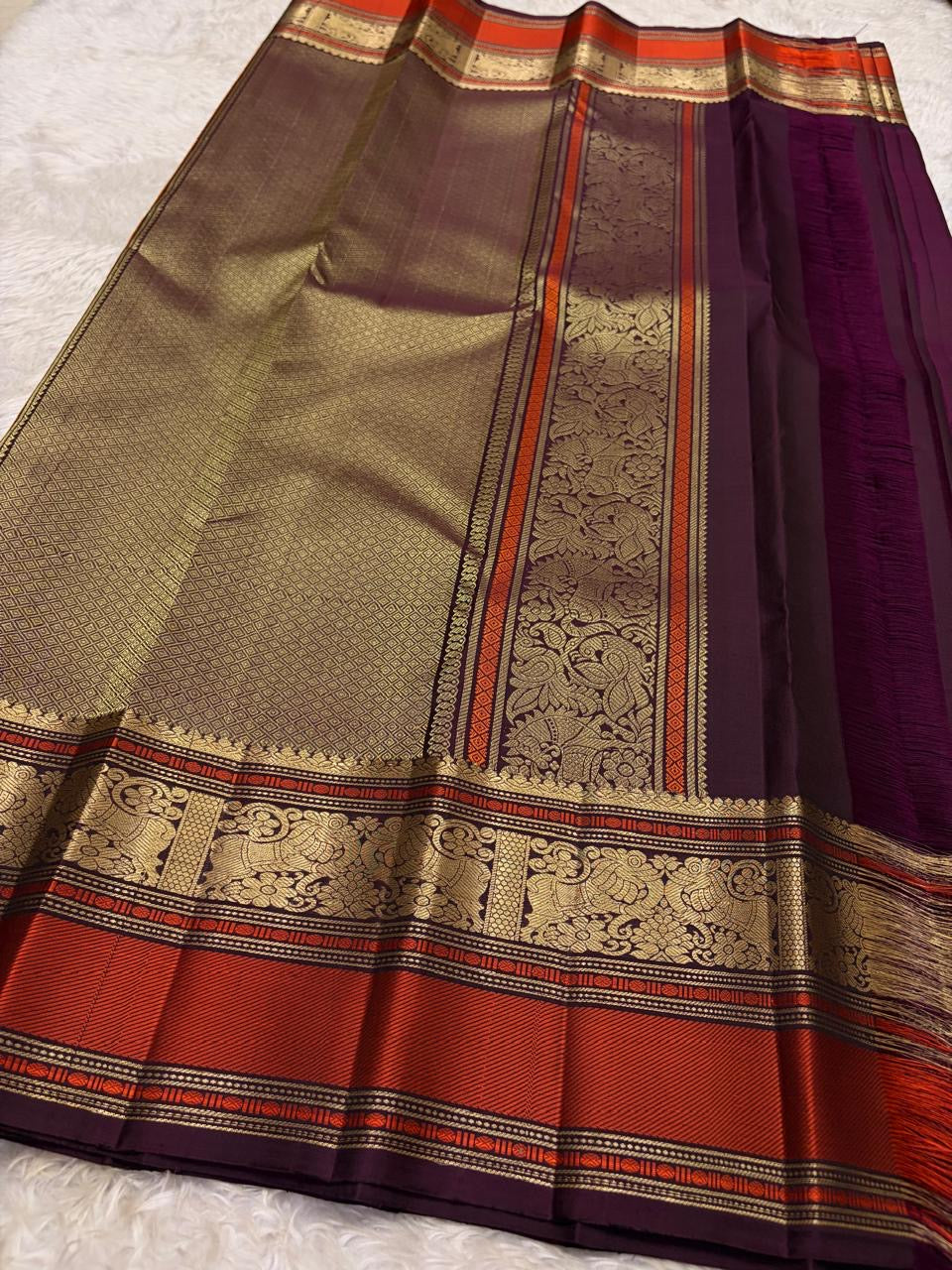 Deep Aubergine Kancheepuram Saree — body close-up showing gold zari buttas