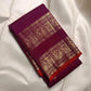 Deep cherry Kanchipuram saree body with small scattered gold zari buttas