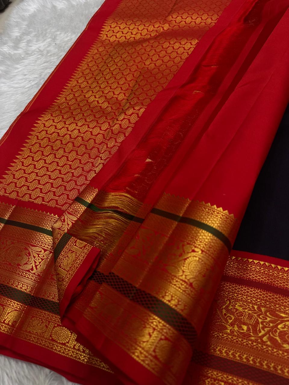 Deep Aubergine Kanjeevaram Korvai saree with vermillion red zari pallu