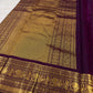 Deep purple Kanjeevaram saree with Mayil border