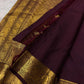 Deep aubergine Pure Silk Kanjivaram Butta saree with antique gold zari motifs and Mayil border