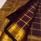 Deep aubergine pure silk Zari Kattam Kancheepuram saree, draped front view