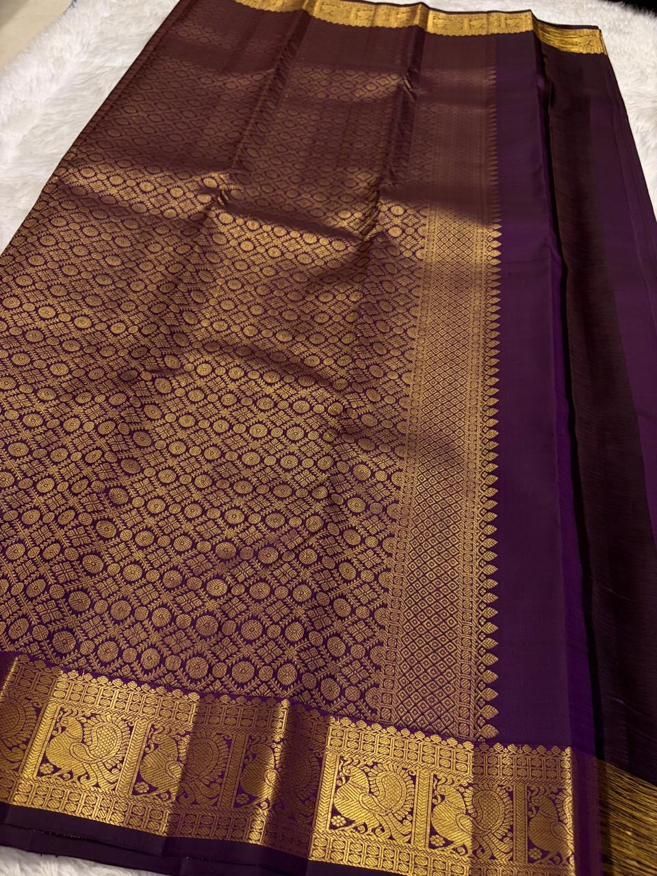 Deep Aubergine Purple pure silk Kanjeevaram Butta saree with handwoven zari paisley buttas