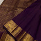 Aubergine Purple Kanchipuram silk saree with petite gold zari buttas and intricate Mayil border