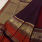 Close view of elephant gold zari motifs framed by ornamental arches on Kanchipuram Varisaipet border.