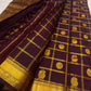Deep aubergine Zari Kattam Kanchipuram saree with Mayil Chakram, close-up