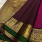 Kanchipattu silk saree in korvai with deep berry pink border weave traditional zari detail