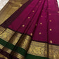 Kanchipattu silk saree in korvai with deep berry pink border weave traditional zari detail