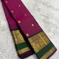 Kanchipattu silk saree in korvai with deep berry pink border weave traditional zari detail
