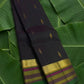 Deep black handwoven Kancheepuram pure silk saree with chedi butta and multi-colour varisaipet border — Idam Living