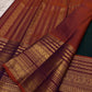 Mayil Butta peacock motif in gold zari on deep bottle green Varisaipet body