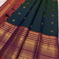 Deep bottle green handwoven pure silk Kanjivaram saree with Varisaipet Mayil Butta and rust orange border — Idam Living