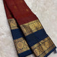 Deep Brick Red KanchiPattu silk saree draped, full length view — Idam Living