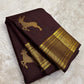 Deep brown Pure Silk Kancheepuram Butta saree with bounding deer motif and wide grey-toned zari border