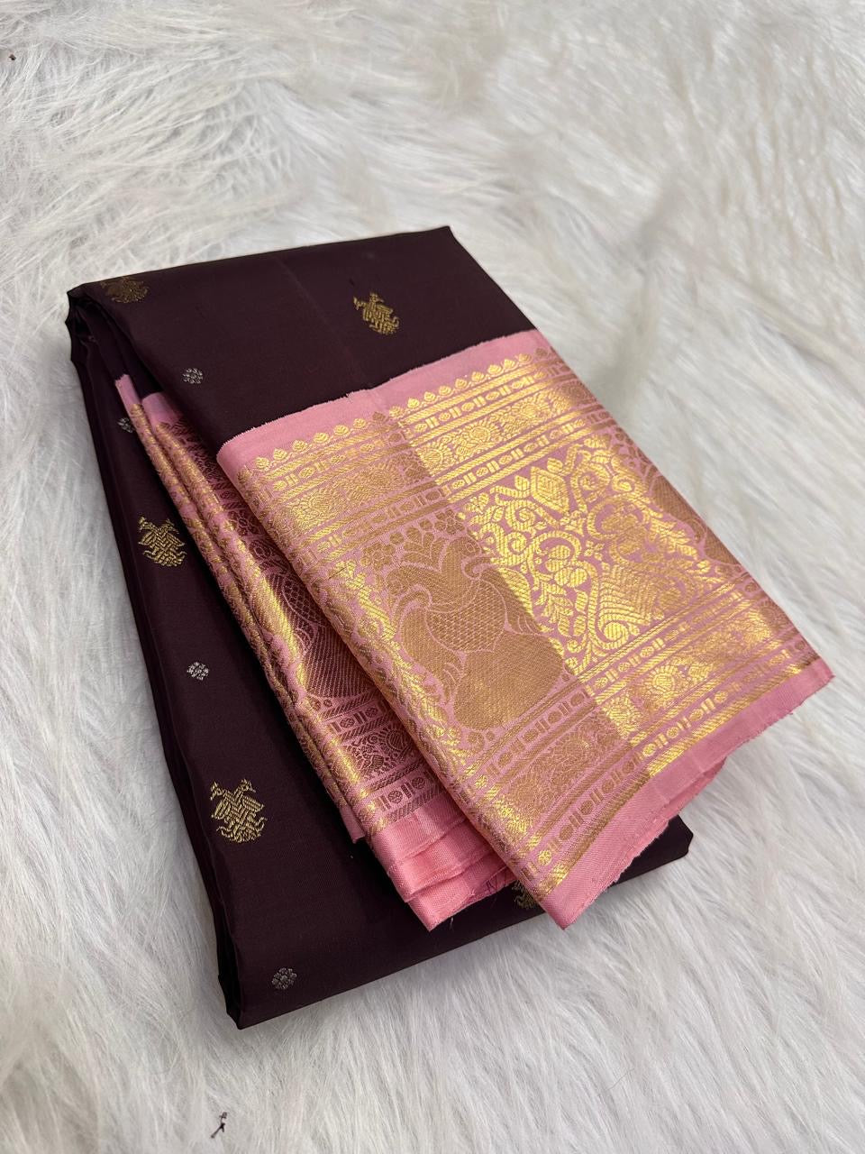 Dusty Rose Pink Korvai border with large gold Mayil motifs on Deep Aubergine Brown Kanchipuram silk.