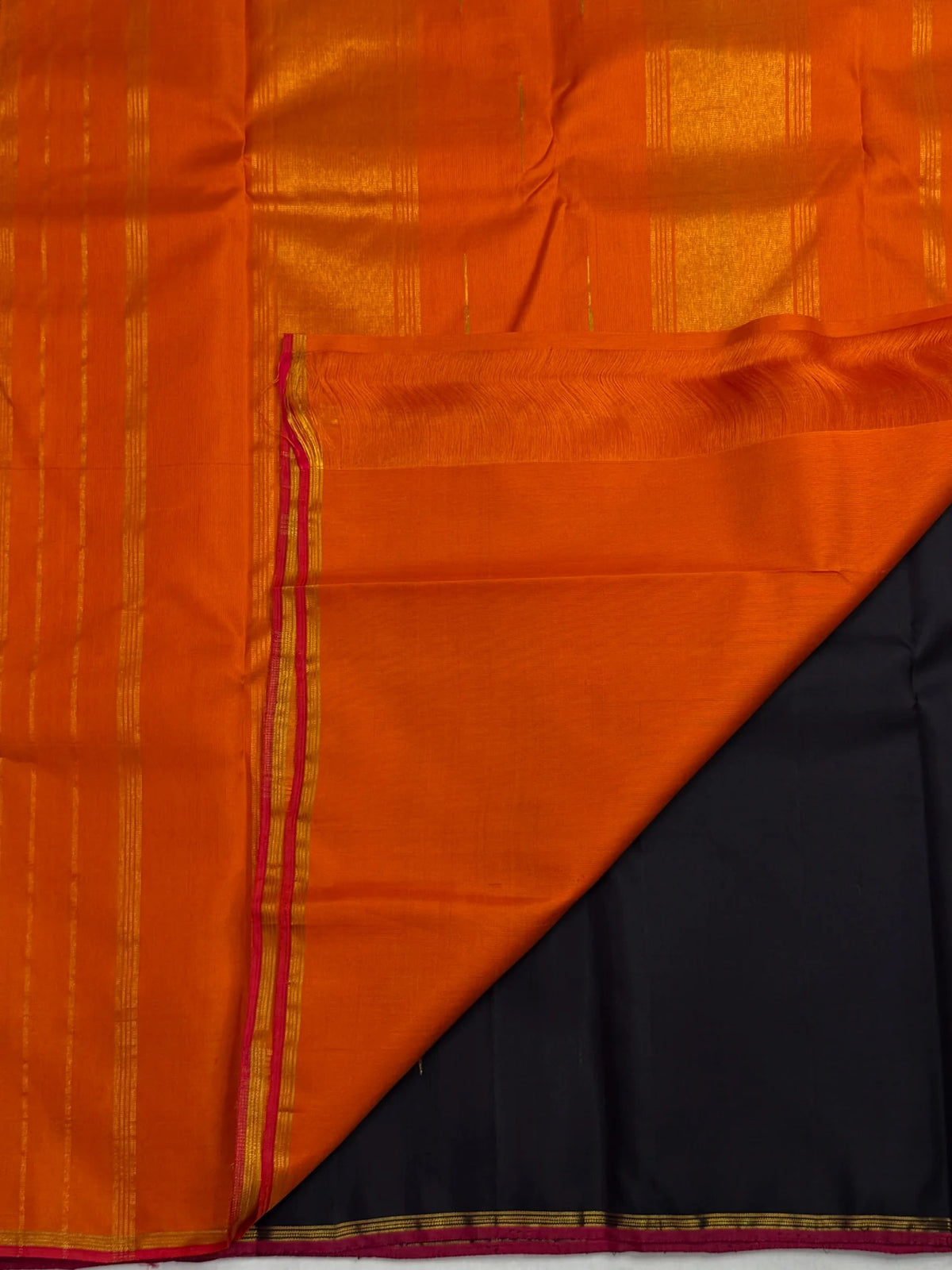Handwoven Kanchipuram Butta saree in Kanchana Deep Brown with Thirushnam Orange with distinctive traditional silk colouring