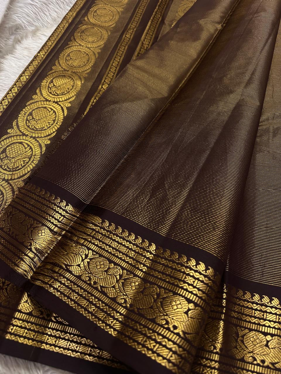 Deep Brown Pure Silk saree with intricate antique gold zari bird motif border