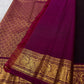 Vadamalli magenta pallu with gold zari lattice on brown Kanchipuram saree