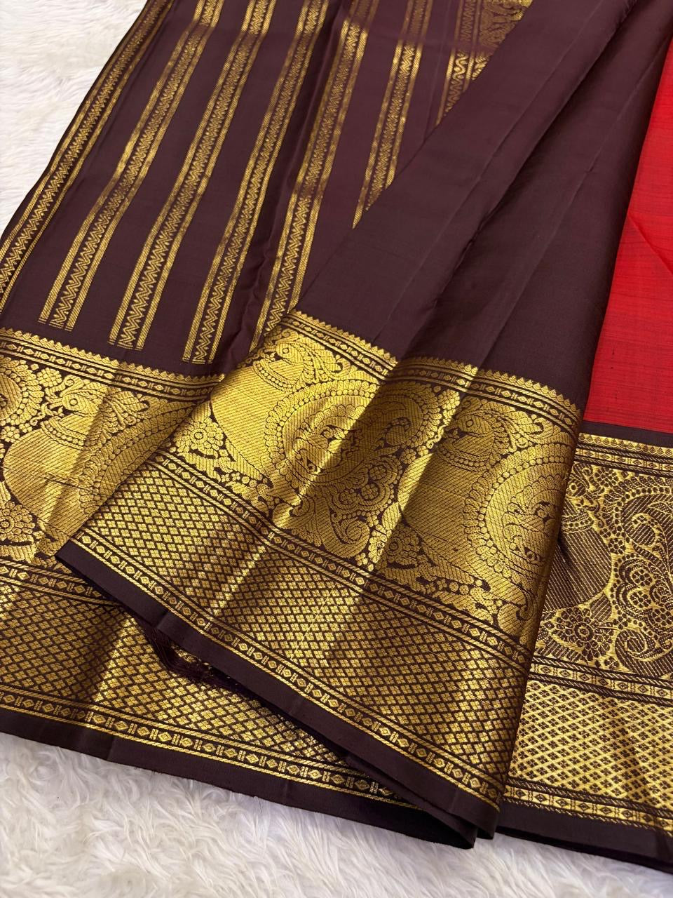 Vermilion Red Handwoven Pure Silk Kanjivaram Saree with Gold Buttas and Deep Brown Peacock Zari Border