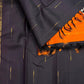 Thirushnam Orange silk pallu with fine gold horizontal stripes contrasting with the deep brown saree body
