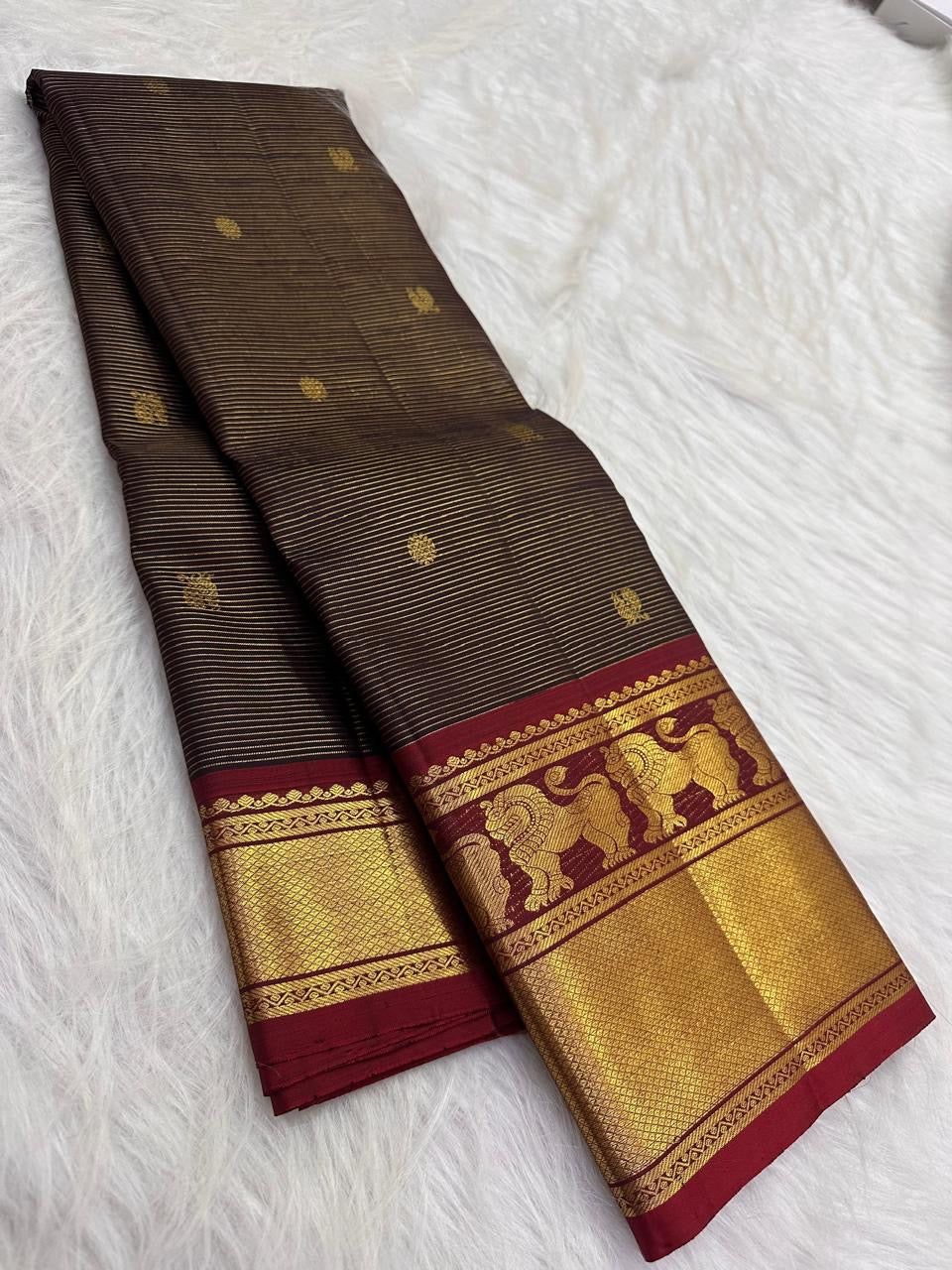 Deep brown Pure Silk Kanchipuram Vairaoosi saree with Arakku red Yazhi zari border