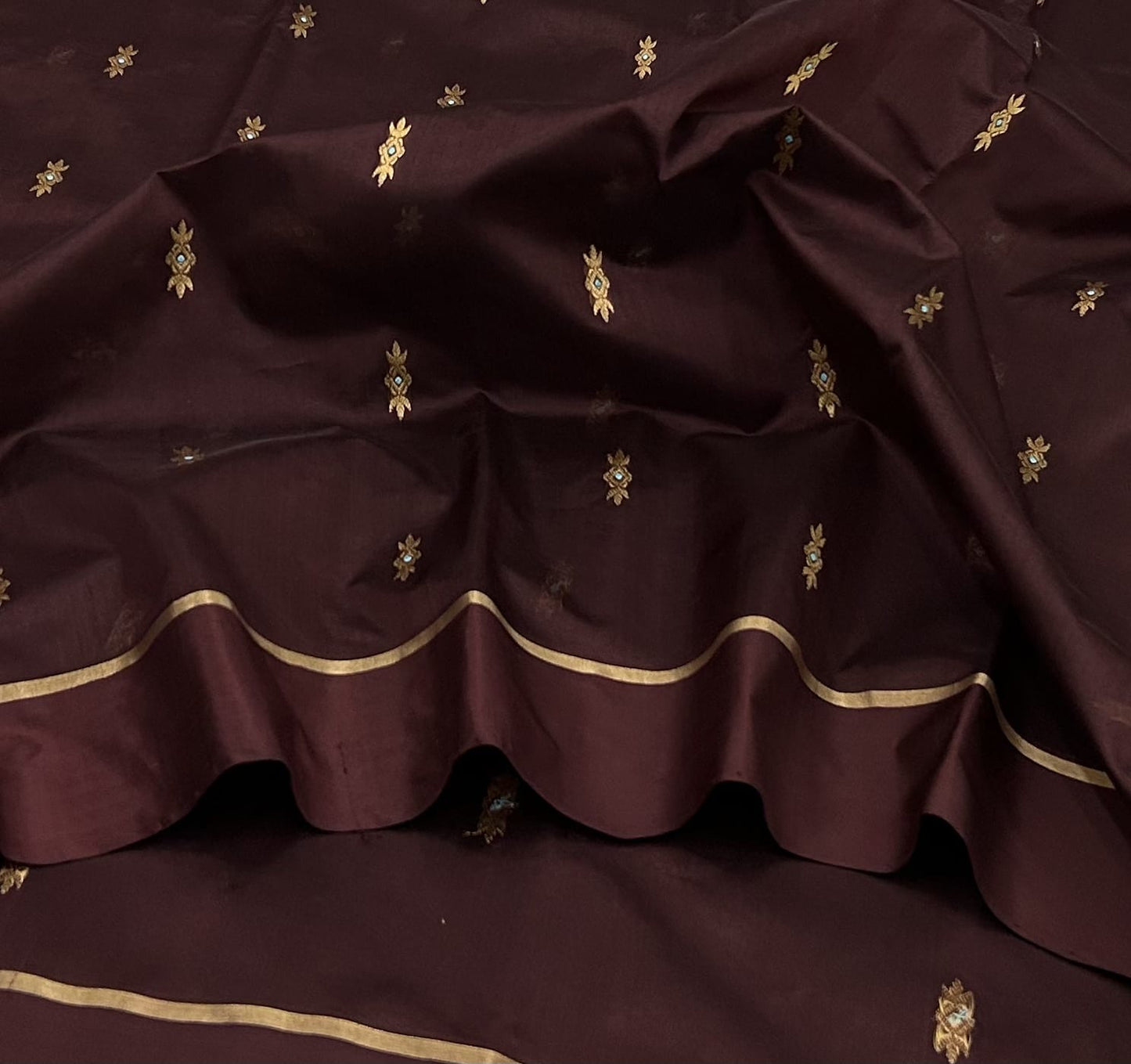 Deep burgundy Chanderi saree with small zari buttas and fine gold border