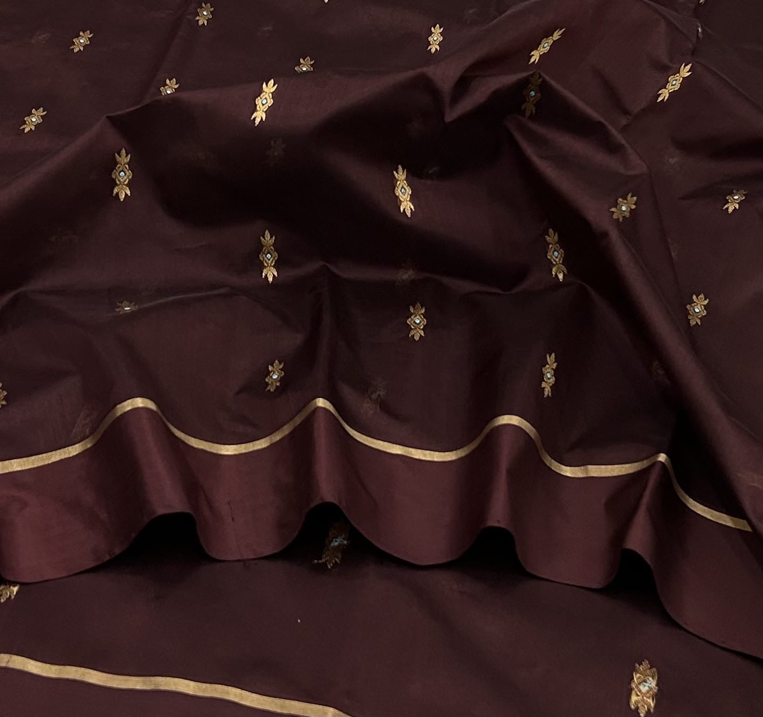 Deep burgundy Chanderi saree with small zari buttas and fine gold border