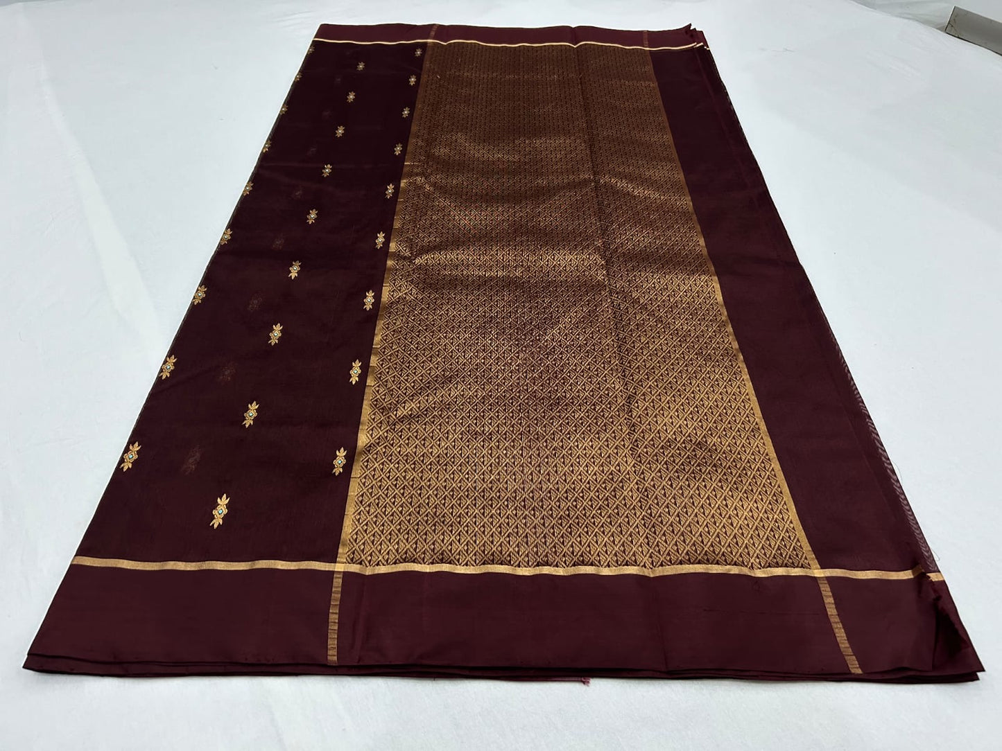 Deep burgundy Handloom Chanderi Pattu Silk saree with fine gold zari buttas