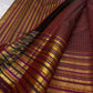 Deep cocoa maroon Varisaipet Kanchipuram saree, styled front view