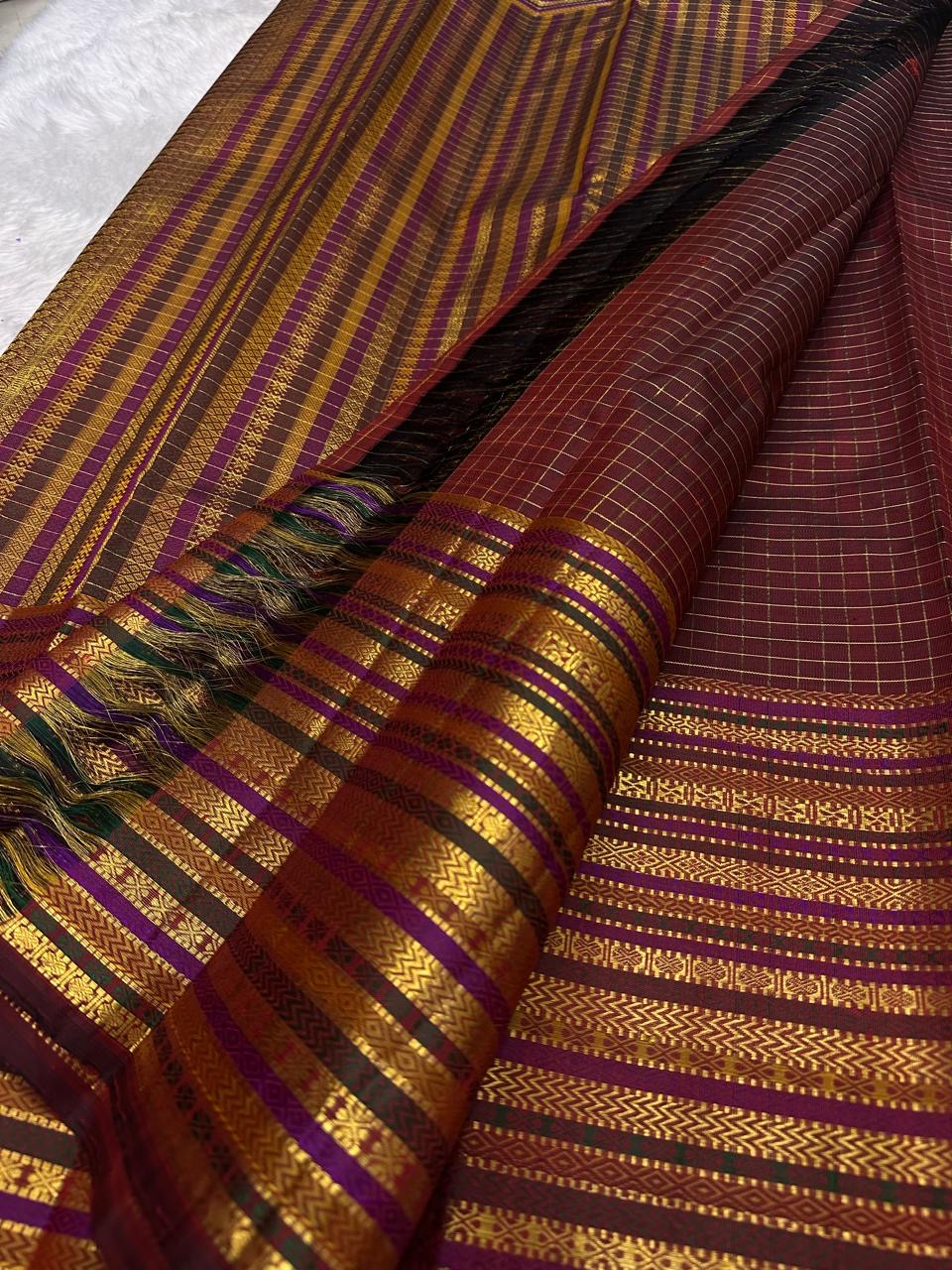 Deep cocoa maroon Varisaipet Kanchipuram saree, styled front view
