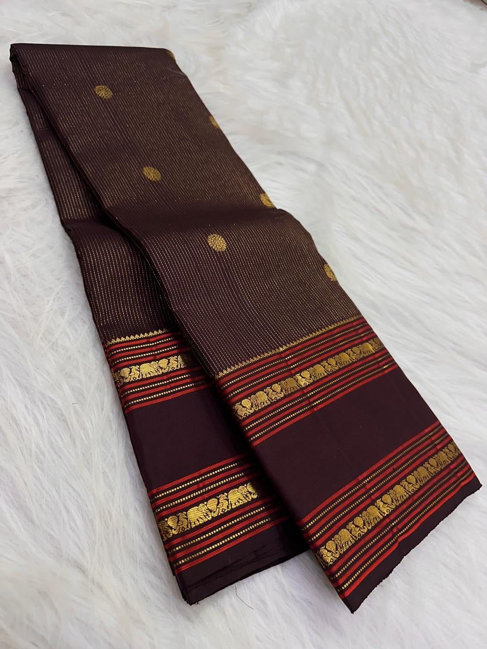 Deep brown Kanchipuram saree with vertical zari stripes