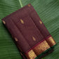 Deep coffee brown Kanchipuram silk saree with antique gold zari kattam and emerald selvedge