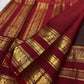 Kanchipuram Zari Kattam saree showing Coffee Brown checked body and detailed Arakku Red Mayil border.