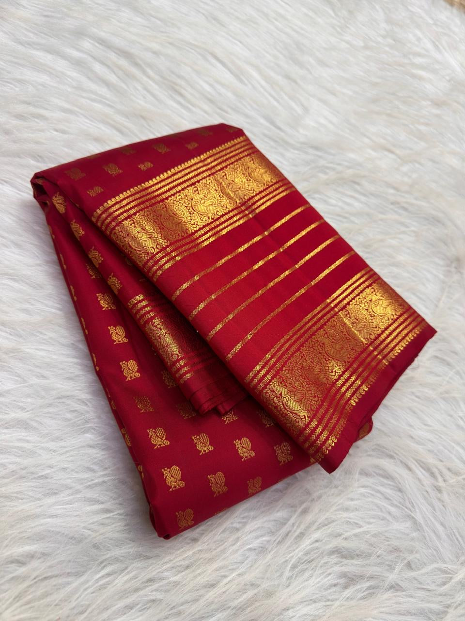 Full Vermilion Pinkish Red Zari Kattam saree showing gold buttas, broad zari border and rich pallu