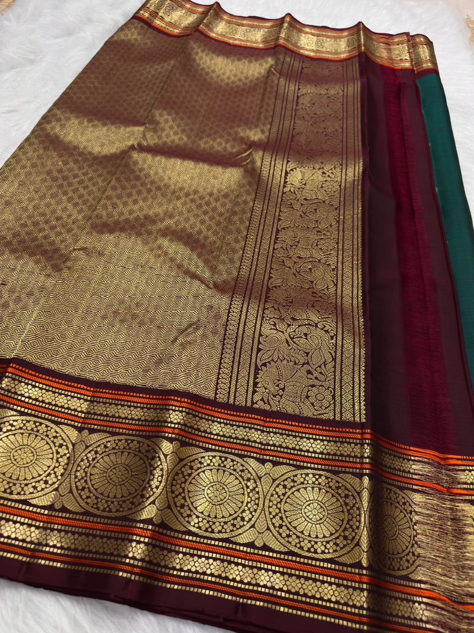 Deep Emerald Green Kancheepuram Saree — body close-up showing scattered gold zari buttas