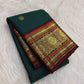 Deep Emerald Green Kancheepuram Saree — pallu detail with gold zari floral medallions