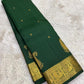 Deep Emerald Green Pure Silk Kanchipuram Butta saree with handwoven gold zari paisley motifs