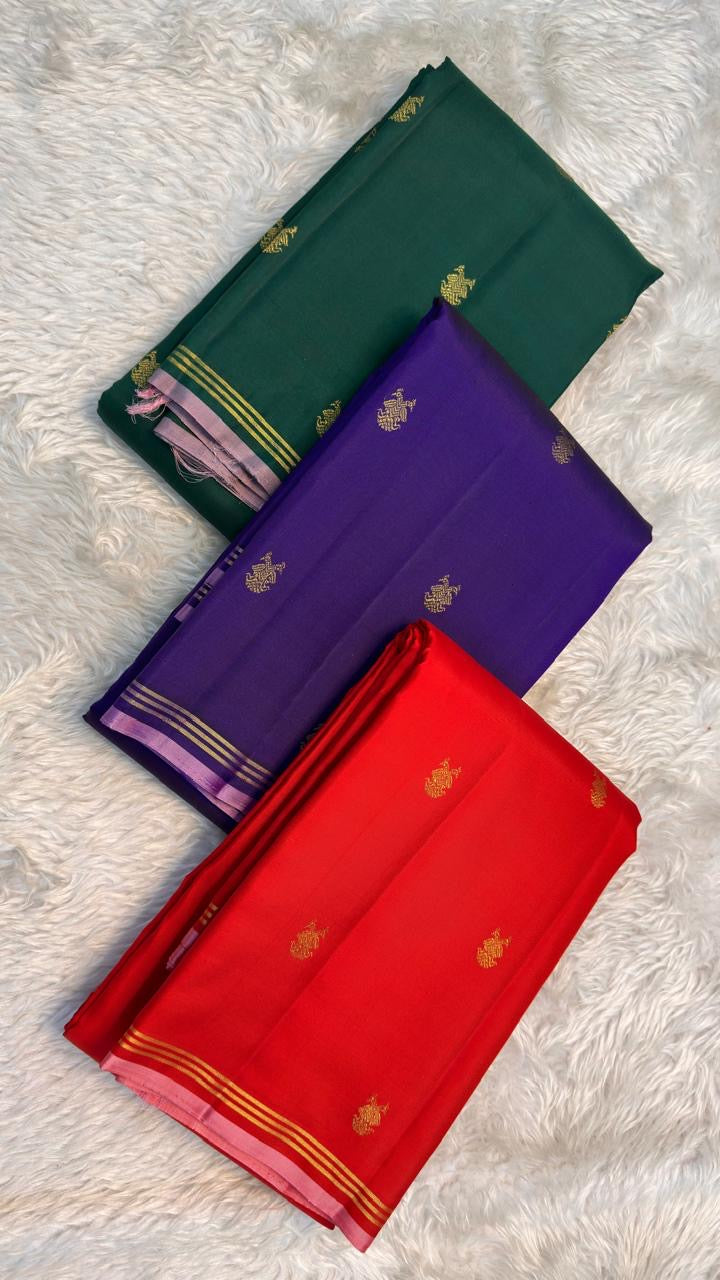 Kanchipattu silk saree in korvai with deep emerald green border weave traditional zari detail