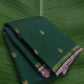 Kanchipuram silk saree in korvai with deep emerald green border weave folded view