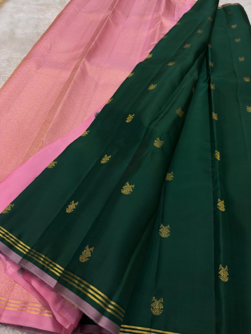 Kanchipattu silk saree in korvai with deep emerald green border weave traditional zari detail