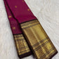 Vadamalli Pink and Antique Gold Kanchipuram saree with vertical zari lines and rich contrast border