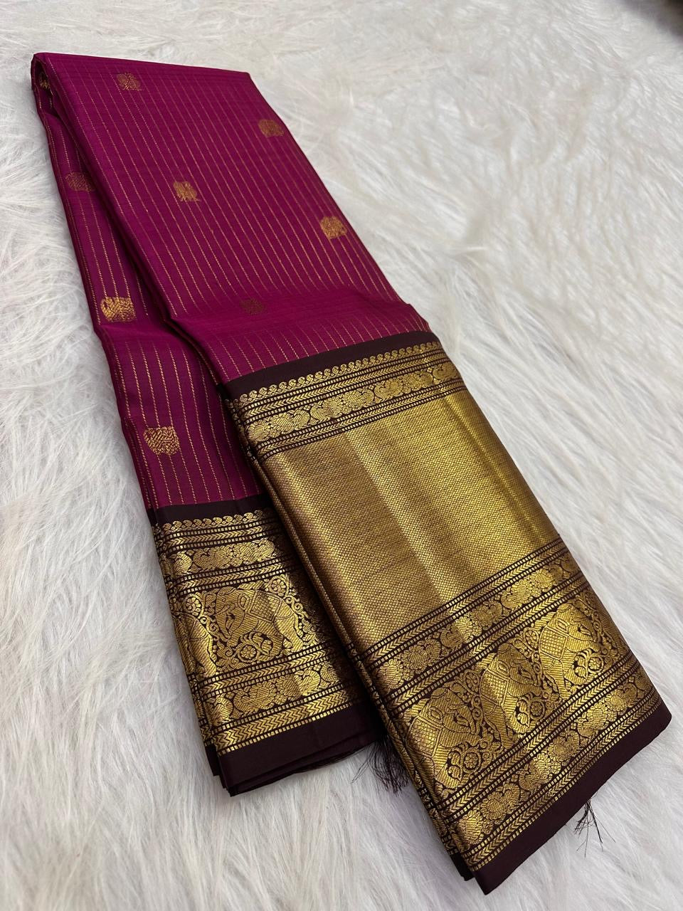 Vadamalli Pink and Antique Gold Kanchipuram saree with vertical zari lines and rich contrast border