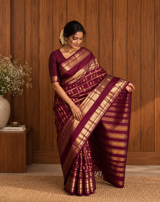 Deep Ennai Arakku pure silk Kanchipuram Zari Kattam saree with Pakshi-inspired classic gold zari border.