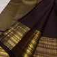 Close folded border view with circular gold zari registers and ornate handwoven detailing