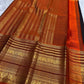 Mayil Butta peacock motif in gold zari on deep espresso brown Varisaipet body
