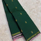 Deep Forest Green handwoven pure silk Kanjivaram Butta saree — radiant pink Gandaberunda zari border detail — Idam Living